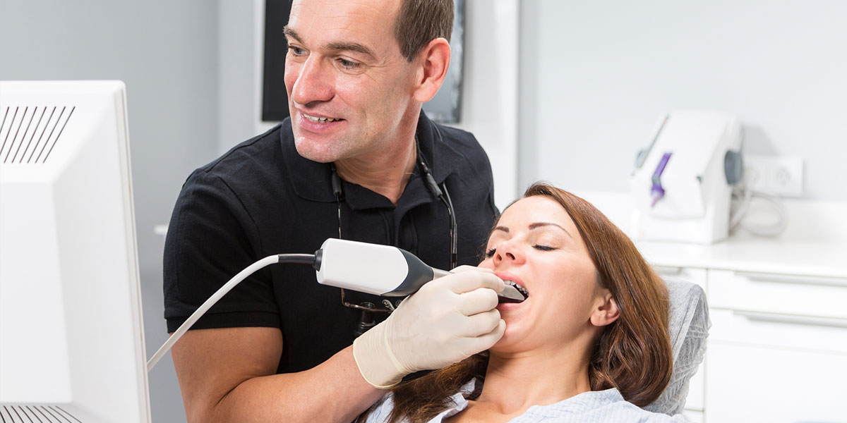 Doctor taking images of teeth