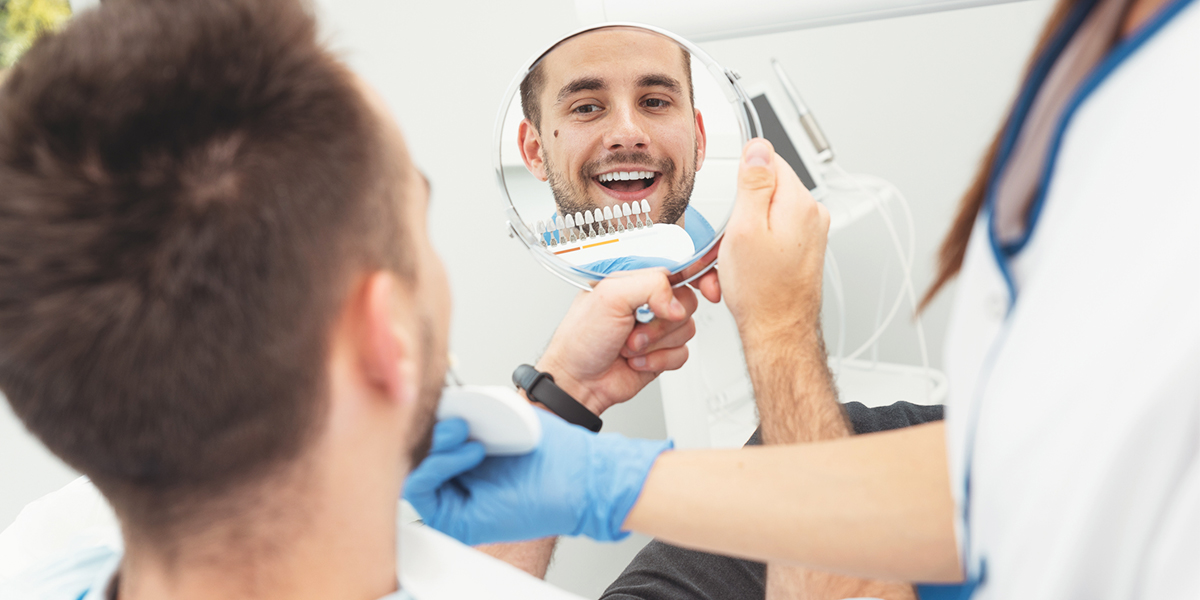 man looking in mirror