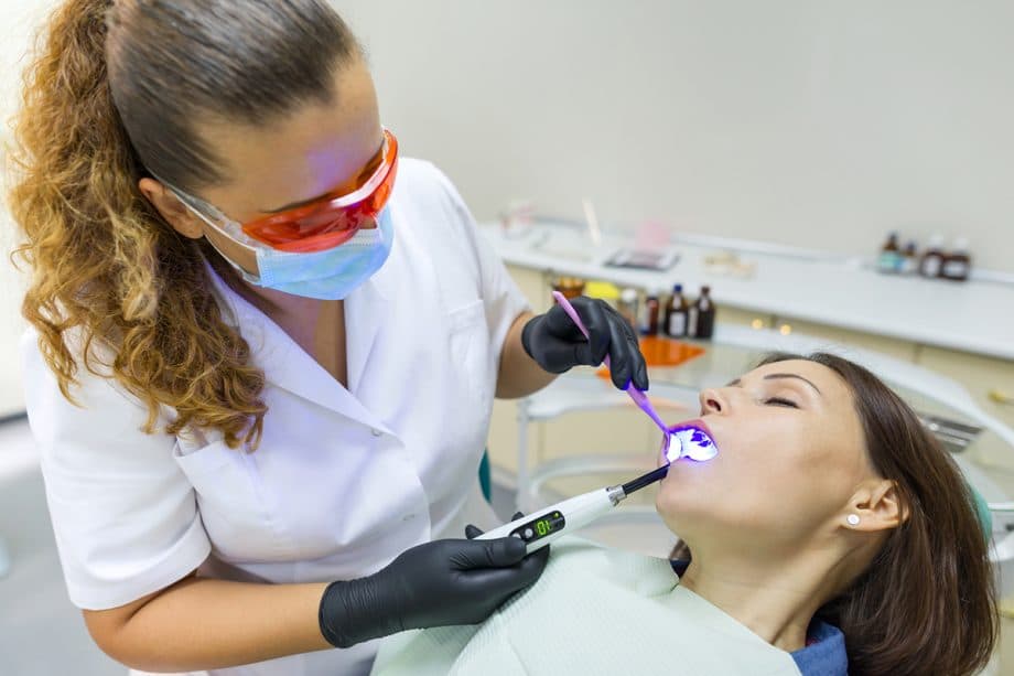 patient undergoes a dental procedure under sedation